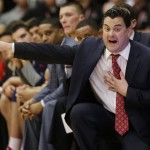 Arizona coach Sean Miller gestures during the second half of an NCAA college basketball game against Stanford on Wednesday, Jan. 29, 2014, in Stanford, Calif. Arizona won 60-57. (AP Photo/Marcio Jose Sanchez)