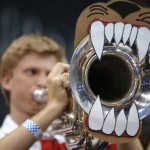 An unidentified Arizona band member plays before Arizona's West Regional semifinal against Ohio State in the NCAA men's college basketball tournament, Thursday, March 28, 2013, in Los Angeles. (AP Photo/Jae C. Hong)