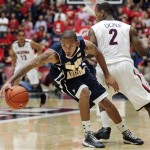 Northern Arizona's Gabe Rogers, front, regains control of the ball against Arizona's Mark Lyons (2) during the first half of an NCAA college basketball game at McKale Center in Tucson, Ariz., Wednesday, Nov. 28, 2012. (AP Photo/John Miller)