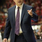 Arizona head coach Sean Miller signals to his team during the second half of an NCAA college basketball game against California at McKale Center in Tucson, Ariz., Sunday, Feb. 10, 2013. California won 77-69. (AP Photo/Wily Low)
