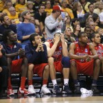 The Arizona bench watches play against Ohio State in the closing minutes of a West Regional semifinal in the NCAA men's college basketball tournament, Thursday, March 28, 2013, in Los Angeles. Ohio State won 73-70. (AP Photo/Jae C. Hong)