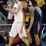 Southern California's James Blasczyk, left, reacts after Arizona's Brandon Ashley missed a ball during the second half of an NCAA college basketball game in Los Angeles, Wednesday, Feb. 27, 2013. USC won 89-78. (AP Photo/Jae C. Hong)