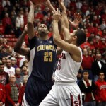 California's Allen Crabbe (23) shoots over Arizona's Nick Johnson (13) during the first half of an NCAA college basketball game at McKale Center in Tucson, Ariz., Sunday, Feb. 10, 2013. (AP Photo/Wily Low)
