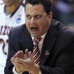 Arizona coach Sean Miller urges his players on in the second half during a third-round game in the NCAA men's college basketball tournament in Salt Lake City on Saturday, March 23, 2013. Arizona beat Harvard 74-51. (AP Photo/George Frey)
