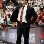 Arizona head coach Sean Miller signals to his players during the second half of an NCAA college basketball game against Stanford at McKale Center in Tucson, Ariz., Wednesday, Feb. 6, 2013. Arizona won 73-66. (AP Photo/Wily Low)