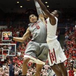 Washington State's Will Dilorio (5) and Arizona's Solomon Hill battles for the ball during the second half of an NCAA college basketball game at McKale Center in Tucson, Ariz., Saturday, Feb. 23, 2013. (AP Photo/Wily Low)
