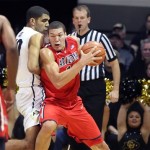 Arizona's Aaron Gordon tries to get around Colorado's Josh Scott during the first half of an NCAA college basketball game, in Boulder, Colo., Saturday, Feb. 22, 2014. (AP Photo/Brennan Linsley)