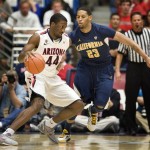 Arizona's Solomon Hill (44) drives to the basket around California's Allen Crabbe (23) during the first half of an NCAA college basketball game at McKale Center in Tucson, Ariz., Sunday, Feb. 10, 2013. (AP Photo/Wily Low)
