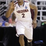 Arizona's Mark Lyons (2) runs up court after hitting a 3 -pointer in the first half of a second-round game in the NCAA college basketball tournament against Belmont in Salt Lake City Thursday, March 21, 2013. (AP Photo/Rick Bowmer)