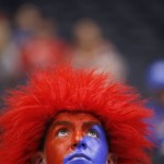 Arizona band member Thomas Gonzalez shows off his colors before Arizona's West Regional semifinal against Ohio State in the NCAA men's college basketball tournament, Thursday, March 28, 2013, in Los Angeles. (AP Photo/Jae C. Hong)