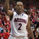 Arizona's Mark Lyons reacts after making a basket and foul shot during the second half of an NCAA college basketball game against Colorado at McKale Center in Tucson, Ariz., Thursday, Jan. 3, 2013. Arizona won 92-83 in overtime. (AP Photo/Wily Low)