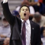 Arizona head coach Sean Miller gestures to his team as they play Gonzaga during the first half of a third-round game in the NCAA college basketball tournament Sunday, March 23, 2014, in San Diego. (AP Photo/Lenny Ignelzi)