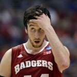 Wisconsin 's Frank Kaminsky reacts during the first half in a regional final NCAA college basketball tournament game against Arizona, Saturday, March 29, 2014, in Anaheim, Calif. (AP Photo/Jae C. Hong)