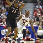 Arizona forward Rondae Hollis-Jefferson (23) is fouled by San Diego State forward Josh Davis (22) during the first half in a regional semifinal of the NCAA men's college basketball tournament, Thursday, March 27, 2014, in Anaheim, Calif. (AP Photo/Mark J. Terrill)