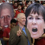 Television commentator and former NBA player Bill Walton, center, poses for a photo, holding a photograph of Stanford women's basketball coach Tara VanDerveer, at right, before an NCAA college basketball game between Stanford and Arizona on Thursday, Jan. 22, 2015, in Stanford, Calif. (AP Photo/Marcio Jose Sanchez)