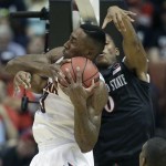 Arizona forward Rondae Hollis-Jefferson, left, competes with San Diego State forward Skylar Spencer for a rebound during the first half of an NCAA men's college basketball tournament regional semifinal, Thursday, March 27, 2014, in Anaheim, Calif. (AP Photo/Jae C. Hong)