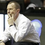 Weber State head coach Randy Rahe watches during a second-round game in the NCAA college basketball tournament against Arizona Friday, March 21, 2014, in San Diego. (AP Photo/Gregory Bull)