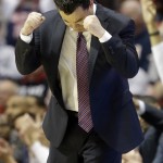 Arizona head coach Sean Miller gestures as his team plays Gonzaga during the second half of a third-round game in the NCAA college basketball tournament Sunday, March 23, 2014, in San Diego. (AP Photo/Lenny Ignelzi)