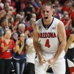 Arizona guard T.J. McConnell (4) reacts after stealing a pass during the first half of an NCAA college basketball game against Utah, Saturday, Jan. 17, 2015, in Tucson, Ariz. (AP Photo/Rick Scuteri)
