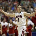 Arizona's T.J. McConnell reacts during the second half in a regional final NCAA college basketball tournament game against Wisconsin, Saturday, March 29, 2014, in Anaheim, Calif. (AP Photo/Jae C. Hong)