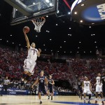 Arizona guard Gabe York scores a basket while playing Gonzaga during the first half of a third-round game in the NCAA college basketball tournament Sunday, March 23, 2014, in San Diego. (AP Photo/Lenny Ignelzi)