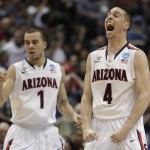 Arizona guard Gabe York (1) and Arizona guard T.J. McConnell (4) cheer during the second half in a regional semifinal NCAA college basketball tournament game against San Diego State, Thursday, March 27, 2014, in Anaheim, Calif. (AP Photo/Jae C. Hong)