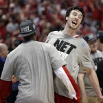 Wisconsin 's Frank Kaminsky celebrates after a regional final NCAA college basketball tournament game against Arizona, Saturday, March 29, 2014, in Anaheim, Calif. Wisconsin won 64-63 in overtime. (AP Photo/Jae C. Hong)