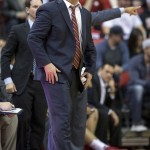 Arizona head coach Sean Miller reacts during the second half an NCAA college basketball game against UNLV, Tuesday, Dec. 23, 2014, in Las Vegas. UNLV won 71-67. (AP Photo/Eric Jamison)