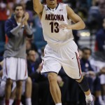 Arizona's Nick Johnson reacts after scoring against Colorado during the second half of an NCAA college basketball game in the semifinals of the Pac-12 Conference on Friday, March 14, 2014, in Las Vegas. Arizona won 63-43. (AP Photo/Julie Jacobson)