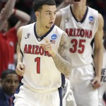 Arizona guard Gabe York (1) reacts in front of center Kaleb Tarczewski (35) after making a three-point basket while playing Xavier during the second half of a college basketball regional semifinal in the NCAA Tournament, Thursday, March 26, 2015, in Los Angeles. (AP Photo/Jae C. Hong)