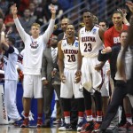 Arizona players celebrate during the second half in a regional semifinal NCAA college basketball tournament game against San Diego State, Thursday, March 27, 2014, in Anaheim, Calif. (AP Photo/Mark J. Terrill)