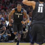 Xavier forward Jalen Reynolds reacts after scoring against Arizona during the second half of a college basketball regional semifinal in the NCAA Tournament, Thursday, March 26, 2015, in Los Angeles. (AP Photo/Mark J. Terrill)