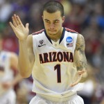 Arizona guard Gabe York (1) cheers during the second half in a regional semifinal NCAA college basketball tournament game against San Diego State, Thursday, March 27, 2014, in Anaheim, Calif. (AP Photo/Mark J. Terrill)