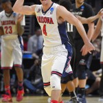 Arizona guard T.J. McConnell reacts after beating Xavier 68-60 in a college basketball regional semifinal in the NCAA Tournament, Thursday, March 26, 2015, in Los Angeles. (AP Photo/Mark J. Terrill)