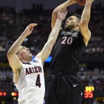 Arizona guard T.J. McConnell (4) defends against San Diego State forward JJ O'Brien (20) during the second half in a regional semifinal NCAA college basketball tournament game, Thursday, March 27, 2014, in Anaheim, Calif. (AP Photo/Mark J. Terrill)