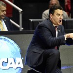 Arizona head coach Sean Miller directs his team during the first half in a second-round game in the NCAA college basketball tournament against Weber State Friday, March 21, 2014, in San Diego. (AP Photo/Denis Poroy)