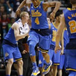 UCLA's Norman Powell celebrates after sinking a 3-point basket against Arizona during the second half of an NCAA college basketball game in the semifinals of the Pac-12 conference tournament Friday, March 13, 2015, in Las Vegas. Arizona defeated UCLA 70-64. (AP Photo/John Locher)