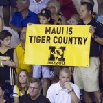 Missouri basketball fans declare "Maui Is Tiger Country" while watching their team play Arizona in the second half of an NCAA college basketball game at the Maui Invitational on Monday, Nov. 24, 2014, in Lahaina, Hawaii. Arizona beat Missouri 72-53. (AP Photo/Eugene Tanner)