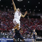 Arizona guard Nick Johnson, above, shoots above Gonzaga guard Gary Bell, Jr. during the first half of a third-round game in the NCAA college basketball tournament Sunday, March 23, 2014, in San Diego. (AP Photo/Lenny Ignelzi)