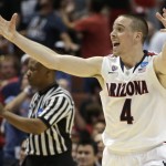 Arizona guard T.J. McConnell (4) celebrates against San Diego State during the second half in a regional semifinal NCAA college basketball tournament game, Thursday, March 27, 2014, in Anaheim, Calif. (AP Photo/Jae C. Hong)