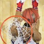 Arizona forward Brandon Ashley dunks during the first half of a college basketball regional semifinal against Xavier in the NCAA Tournament, Thursday, March 26, 2015, in Los Angeles. (AP Photo/Mark J. Terrill)