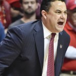 Arizona coach Sean Miller shouts during the first half of a second-round game in the NCAA college basketball tournament against Weber State Friday, March 21, 2014, in San Diego. (AP Photo/Denis Poroy)