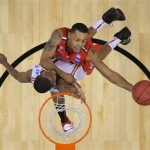 Arizona guard Mark Lyons shoots against Ohio State forward Sam Thompson during the first half of a West Regional semifinal in the NCAA men's college basketball tournament, Thursday, March 28, 2013, in Los Angeles. Ohio State won 73-70. (AP Photo/Mark J. Terrill)