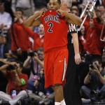 Arizona's Mark Lyons walks off the court after Arizona lost to Ohio State, 73-70, in their West Regional semifinal in the NCAA men's college basketball tournament, Thursday, March 28, 2013, in Los Angeles. (AP Photo/Jae C. Hong)