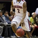 Arizona guard Mark Lyons (2) dribbles upcourt while playing against San Diego State in the first half of an NCAA college basketball game at the Diamond Head Classic, Tuesday, Dec. 25, 2012, in Honolulu. (AP Photo/Eugene Tanner)