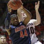 Arizona's Solomon Hill (44) pulls down a rebound in front of Utah's Renan Lenz (10) in the first half during an NCAA college basketball game on Sunday, Feb. 17, 2013, in Salt Lake City. (AP Photo/Rick Bowmer)