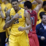  California forward Richard Solomon (35) reacts after scoring against Arizona during the first half on an NCAA college basketball game on Saturday, Feb. 1, 2014, in Berkeley, Calif. (AP Photo/Marcio Jose Sanchez)