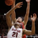 Arizona forward Aaron Gordon, top, blocks a layup attempt from Stanford forward Anthony Brown (21) during the second half of an NCAA college basketball game Wednesday, Jan. 29, 2014, in Stanford, Calif. Arizona won 60-57. (AP Photo/Marcio Jose Sanchez)