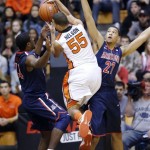 Oregon State forward Drew Mellon, middle, drives between Arizona's Solomon Hill,left, and Brandon Ashley on his way to the basket during the first half of an NCAA college basketball game in Corvallis, Ore., Saturday, Jan. 12, 2013. (AP Photo/Don Ryan)
