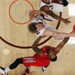 Arizona forward Rondae Hollis-Jefferson, bottom, shoots over Stanford center Grant Verhoeven during the first half of an NCAA college basketball game on Wednesday, Jan. 29, 2014, in Stanford, Calif. (AP Photo/Marcio Jose Sanchez)